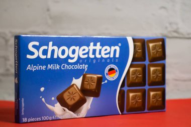 January 14, 2023 Ukraine city Kyiv chocolate Schogetten on a colored background