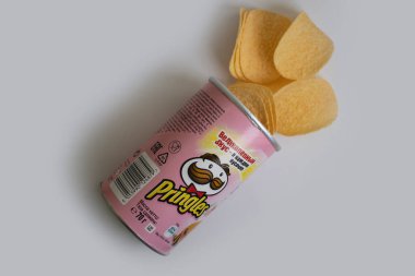 April 24, 2022 Ukraine Pringles chips on a colored background