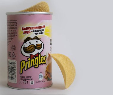 April 24, 2022 Ukraine Pringles chips on a colored background