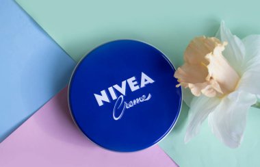 May 1, 2022 Ukraine city Kyiv jar of Nivea cream, narcissus flower