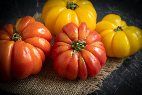 Ripe Tomatoes Old Background Royalty Free Stock Photos