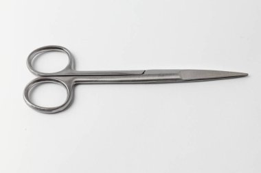 Precision stainless steel scissors for medical, craft, and beauty use. Clean isolated on white.