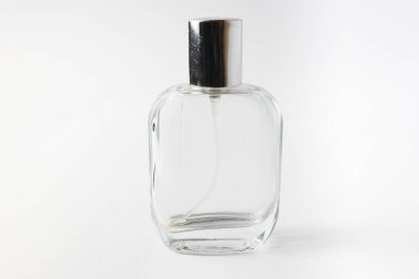 Simple and elegant empty perfume bottle standing upright on white background. Perfect for branding, mockups, cosmetic ads, or minimalist product presentations.
