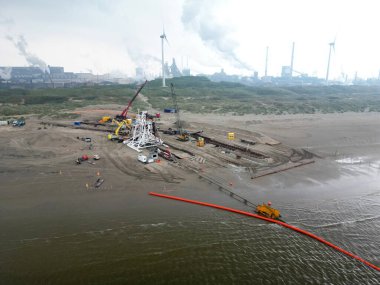 Connecting a seacable from an offshore windpark to an onshore power hub in Wijk aan Zee, the Netherlands clipart