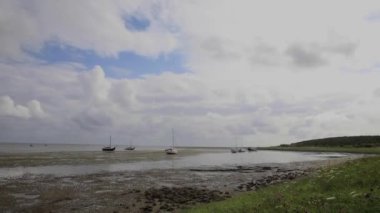 Wadden Denizi, Hollanda 'da yükselen gelgit hareketini gösteren yelkenli teknelerinin sallantısı