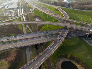 Aerial view of a cloverleaf interchange highway, The Haque, The Netherlands clipart