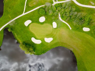 Aerial view of the bunkers of a golf court clipart