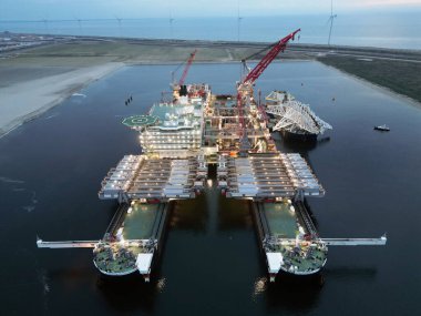 Aerial view of a large pipelaying and heavy lifting vessel, Maasvlakte, Holland clipart