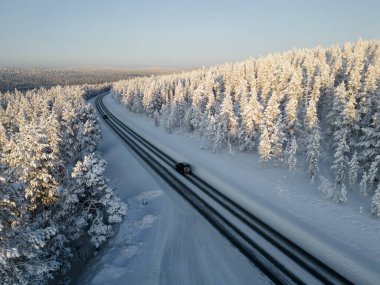 Aerial view of the road between Ivalo and Saariselka, Finland clipart