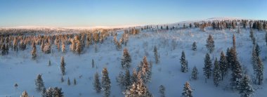 Panoramic view of the winterlandscape near the summit closeby Fell Centre Kiilopaa, Finland clipart