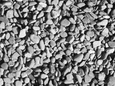 Tek renkli bir uygulamadaki kaba çakıl taşlarının tam biçimli görünümü.