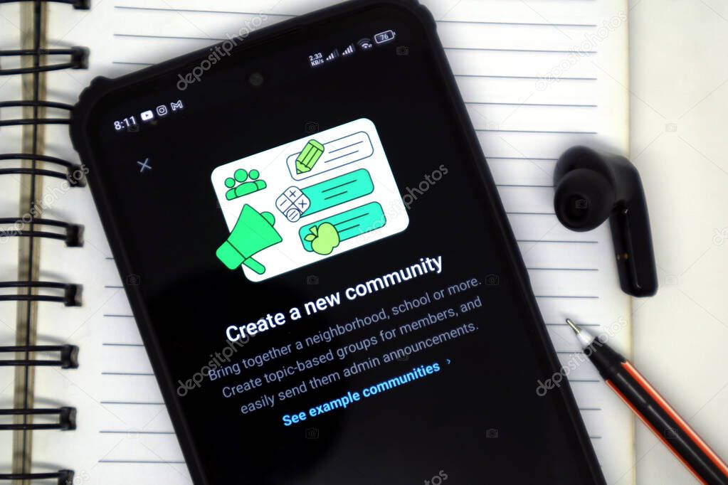 Madiun, Indonesia - September 20, 2025: The create a new community feature on the WhatsApp application is displayed on Android smartphones.