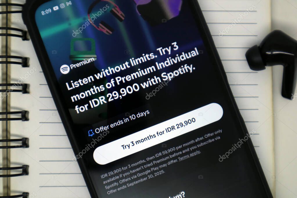 Madiun, Indonesia - September 20, 2025 : Spotify App subscription packages in Indonesia are displayed on Android smartphones.