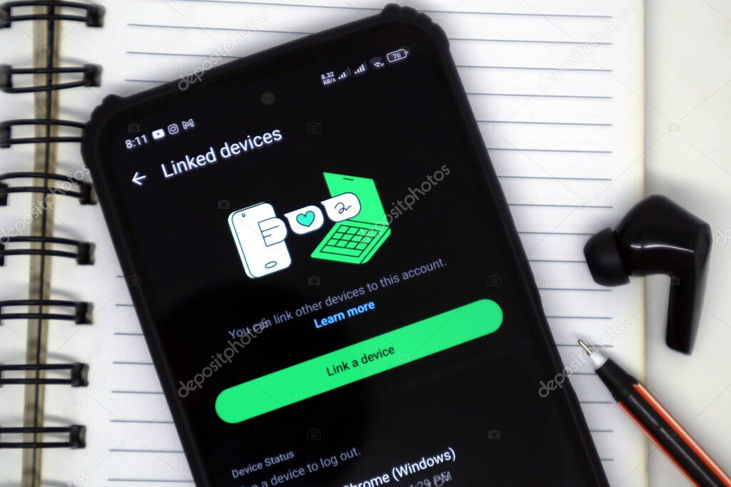 Madiun, Indonesia - September 20, 2025: The linked devices feature on the WhatsApp application is displayed on Android smartphones.