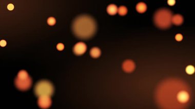 Soft glowing orange bokeh lights on dark background. Abstract festive blur effect with warm tones, perfect for holiday design, romantic atmosphere, celebration, and elegant visuals