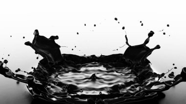 Bir siyah yağ sıçraması yansıtıcı yüzeyde bir taç şekli oluşturur, hareket halinde yakalanır.