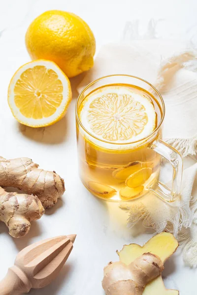 stock image Ginger tea in a glass mug. Winter vitamin drink for immunity boosting.