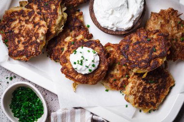 Hanukkah latkes - traditional Jewish potato pancakes. clipart