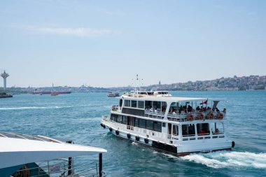 Istanbul, Turkey - 26 August 2025: Istanbul Bosphorus Strait with boats, ferries, bridges and city skyline. Panoramic view of strait connecting two continents. European and Asian sides of city