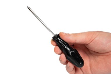 Screwdriver held in hand on white background. Tool, craftsmanship, work and manual skill concept