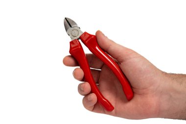 Flush cutter held in hand on white background. Tool, craftsmanship, work and manual skill concept