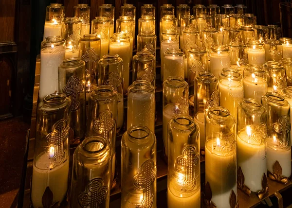 Stock image Montreal, Canada - September 5, 2022: Montreal, Canada - September 5, 2022: Notre Dame Cathedral interior. Little candles in the church at darkness. High quality photo