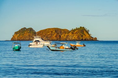 Hermosa beach, Costa Rica - December 14, 2021: Beautiful sunrise at Playa Hermosa, Costa Rica, Pacific coast. High quality photo.