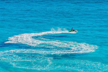 Jet Ski in the Caribbean sea, tropical Ocean, Vacation Concept, Cancun, Mexico.