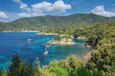 idyllic coastal Landscape on Island of Elba close to Marina di Campo with bathing island from Paoline,Napoleon Bonaparte`s sister,Tuscany,mediterranean Sea,Italy
