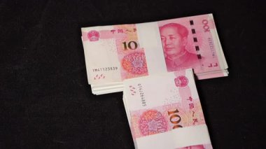 Yığınla Para (Çin parası) Düşen Video.Çin parası iki isimle verilir: Çin Yuanı (CNY) ve Renminbi (RMB)