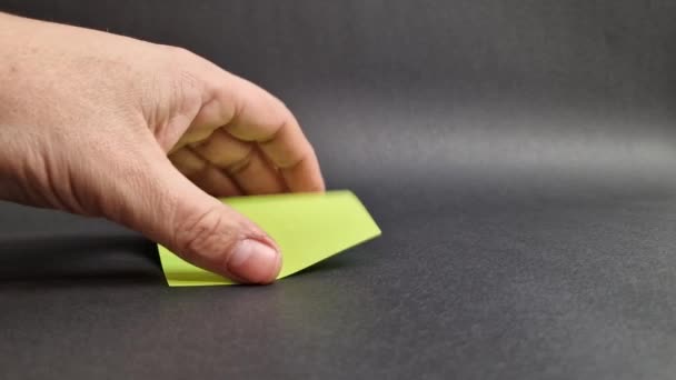 Hand Man Crumples Blank Green Sheet Paper — Stock Video