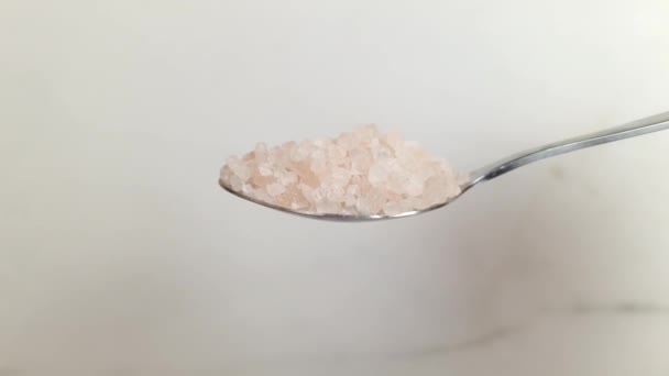 Pink Crystal Himalayan Salt Falls Spoon Close Slow Motion — Video