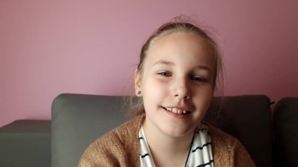 Lovely Cheerful Preteen Girl Good Mood Smiling Gently Sitting Sofa — Video Stock