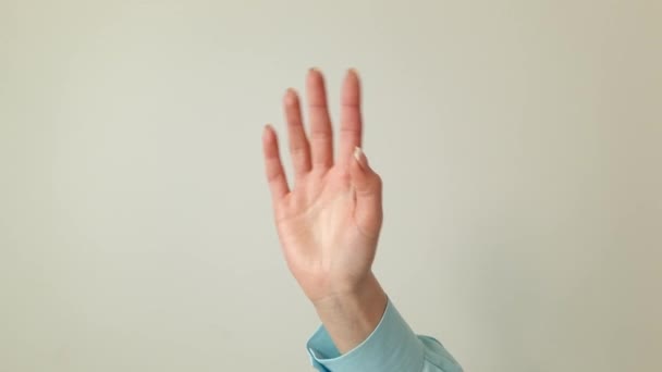 Female Hand Waving Hand Gesture Greeting Hello Goodbye Concept — Video Stock