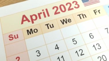 Tax payment day marked on a calendar - April 18, 2023, financial concept