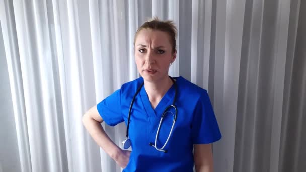 Angry Tired Young Female Caucasian Doctor Talking Loudly Showing Negative — Vídeo de stock