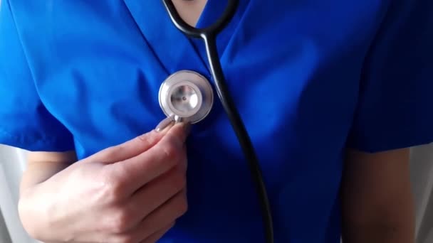 Female Medicine Doctor Hand Holding Stethoscope Physician Ready Examine Patient — Stock video