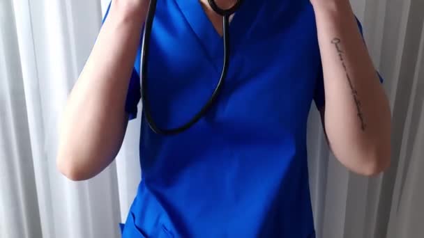 Female Doctor Putting Stethoscope Getting Ready Patient Examination Medical Health — Stock video