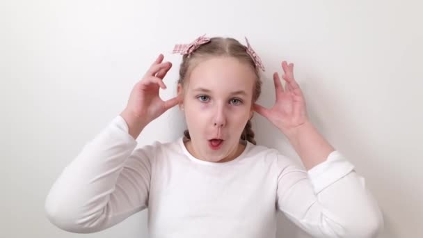 Happy Joyful Little Girl Making Funny Faces White Background Childhood — Video