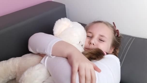 Little Girl Teddy Bear Sofa Childhood Lifestyle Concept — Video Stock