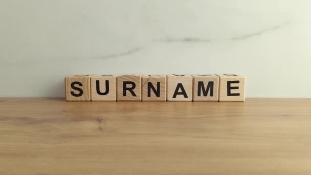 Word Surname Wooden Blocks Desk — Stock Video