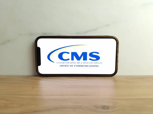 stock image Konskie, Poland - June 17, 2023: CMS Centers for Medicare and Medicaid Services US federal agency logo displayed on mobile phone screen