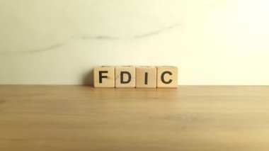 FDIC 'in kısaltması tahta bloklardan. Federal Mevduat Sigorta Şirketi kısaltması. Maliye ve ekonomi kavramı