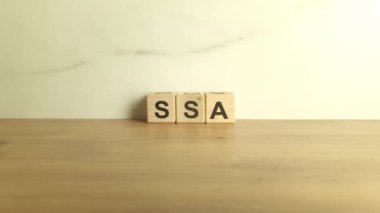 Kısaltması ahşap bloklardan geliyor. Sosyal Güvenlik İdaresi kısaltması