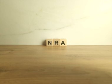 NRA 'nın kısaltması ahşap bloklardan. Ulusal Tüfek Birliği kısaltması
