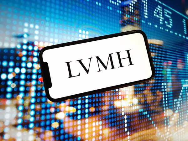 stock image Konskie, Poland - January 03, 2024: LVMH Moet Hennessy Louis Vuitton company logo displayed on mobile phone screen