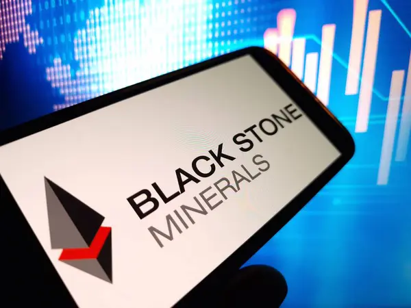 stock image Konskie, Poland - May 27, 2024: Black Stone Minerals company logo displayed on mobile phone