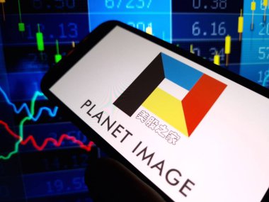 Konskie, Poland - June 09, 2024: Planet Image International Limited company logo displayed on mobile phone clipart