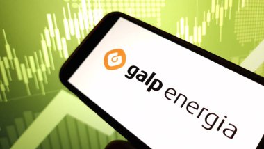 Konskie, Poland - December 08, 2024: Galp Energia company logo displayed on mobile phone clipart