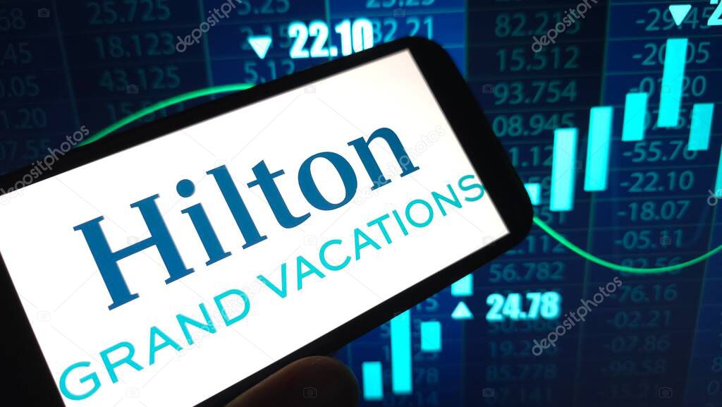 Konskie, Poland - April 12, 2025: Hilton Grand Vacations company logo displayed on mobile phone